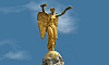 Victoire en bronze doré dominant la fontaine du Palmier, Place du Châtelet, Paris, France, 31 mai 2014